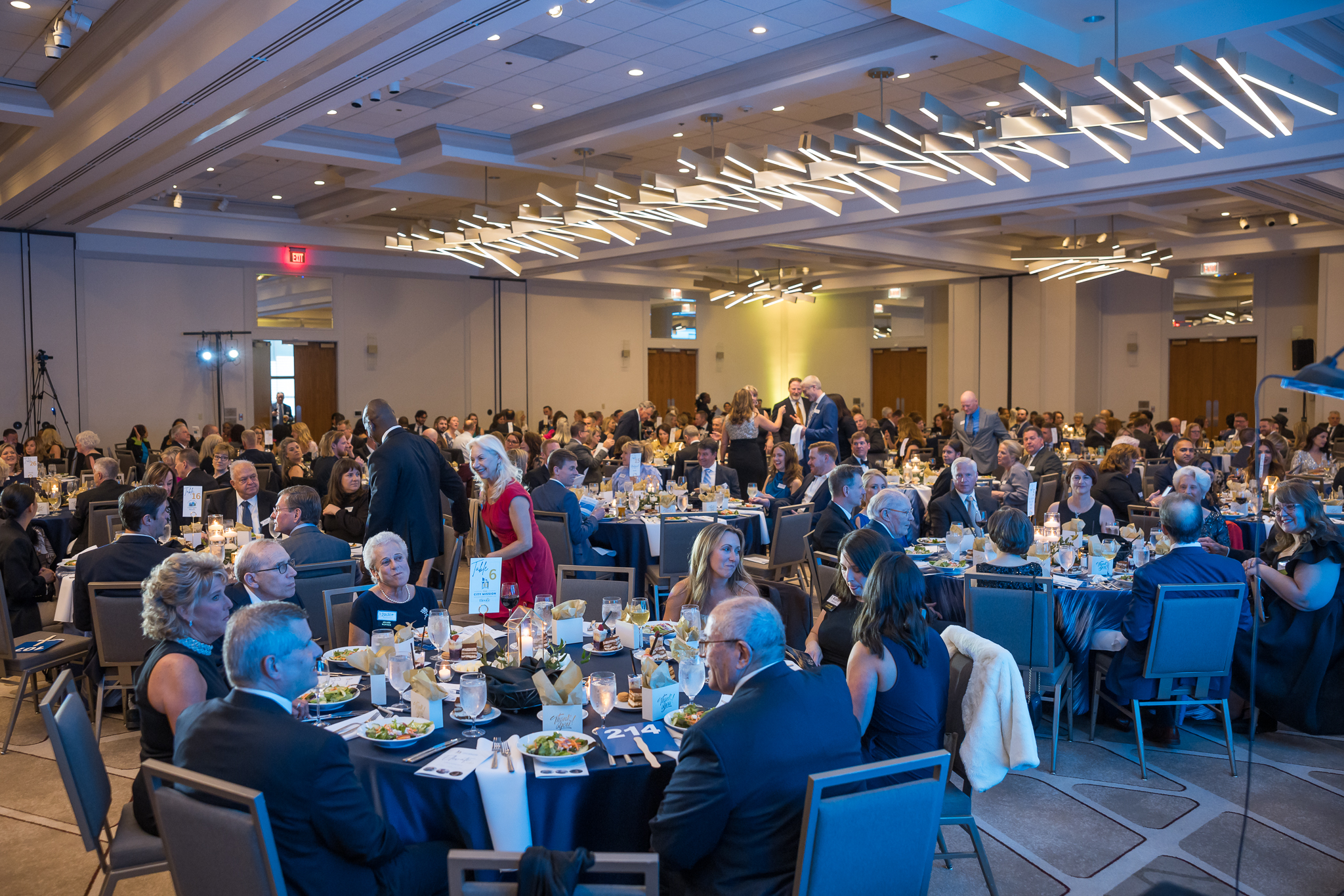 The Associate Board at a gala event posing for a group photo together